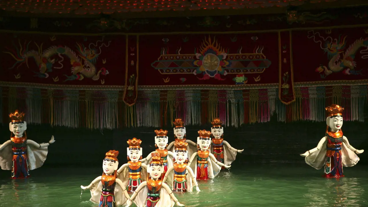 Saigon Evening Tour with Water Puppetry Show and Dinner Cruise - Photo 1